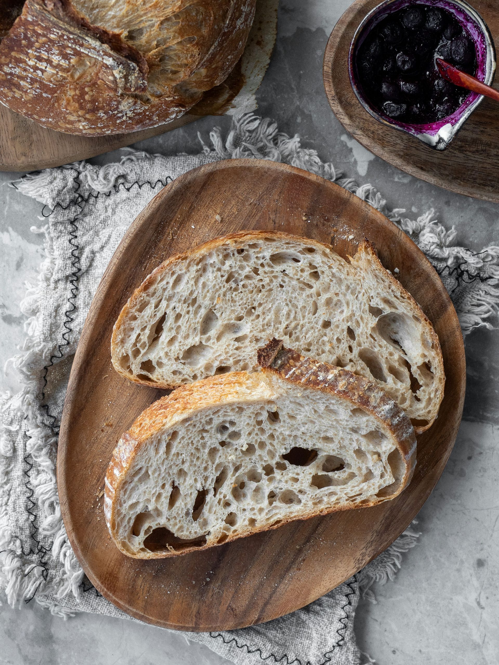 bread on brown wooden round tray